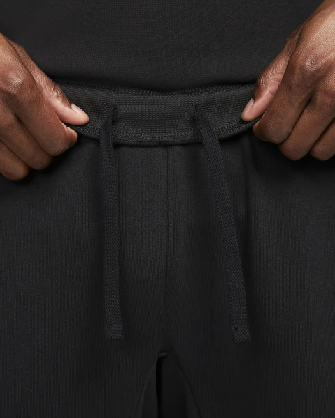 Спортивные штаны Nike M NKCT DF HERITAGE FLEECE PANT черные DQ4587-010