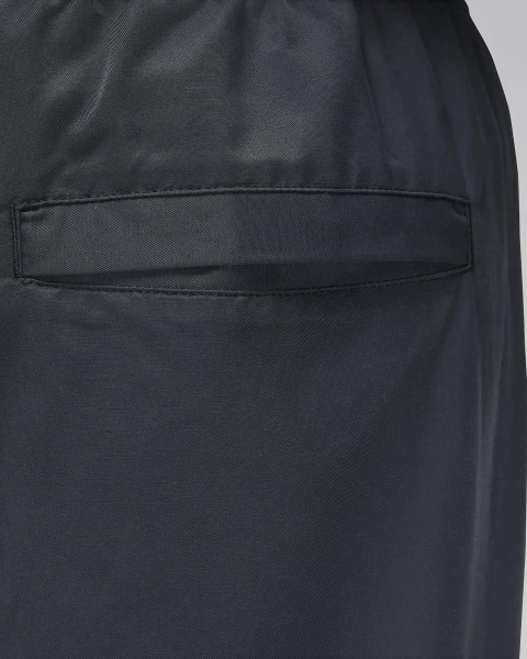 Спортивні штани Nike JORDAN ESSENTIALS WOVEN PANTS темно-сірі FN4539-010
