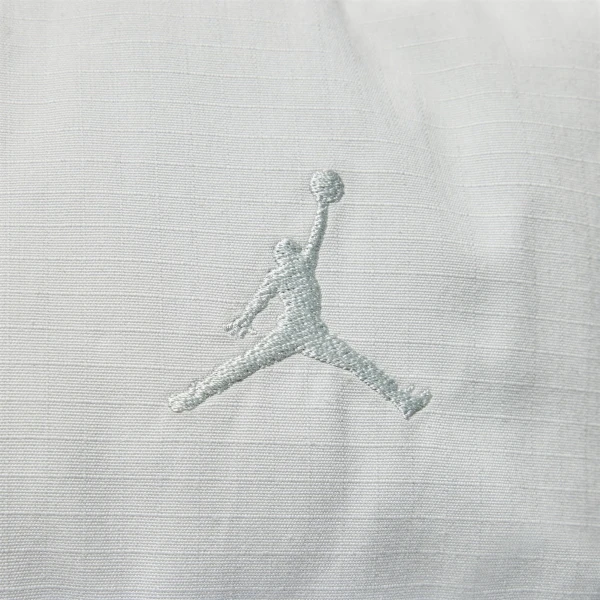 Пуховик Nike JORDAN MJ FLIGHT HERITAGE DOWN JACKET світло-сірий FN6346-034