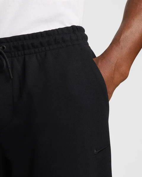Спортивні штани Nike PRIMARY DRI-FIT UV VERSATILE JOGGERS чорні FZ0975-010