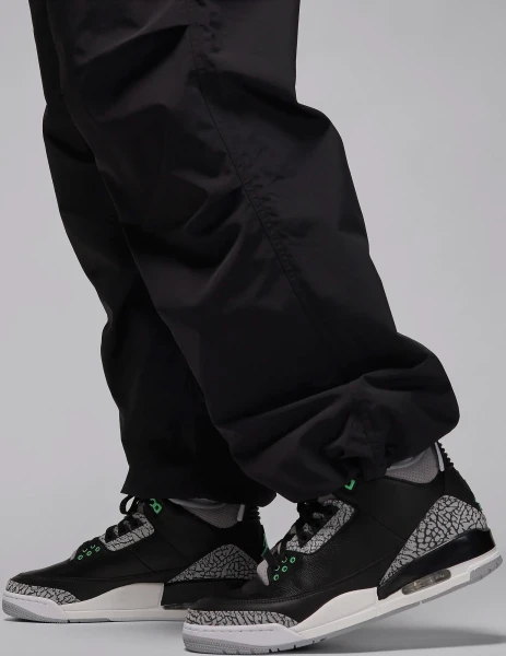 Спортивные штаны Nike JORDAN ESSENTIALS WOVEN PANTS черные FV7306-010