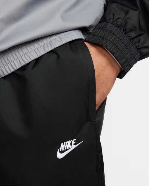 Спортивный костюм Nike CLUB WOVEN TRACKSUIT черно-серый HJ1985-010