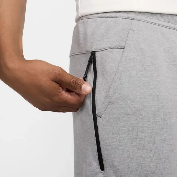 Спортивные штаны Nike SPORTSWEAR TECH ESSENTIALS серые DD5293-002