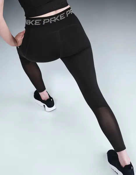 Лосини жіночі Nike PRO MID-RISE 7/8 MESH-PANEL GRAPHIC чорні HV2306-010