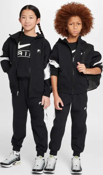 Спортивний костюм підлітковий Nike AIR FLEECE чорно-білий HV1219-010__HF8811-010