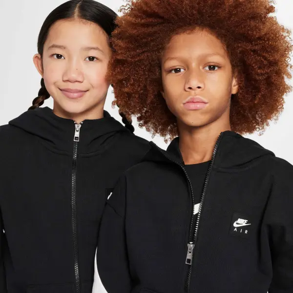 Спортивний костюм підлітковий Nike AIR FLEECE чорно-білий HV1219-010__HF8811-010