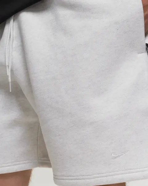 Шорты Nike SOLO SWOOSH FLEECE SHORTS молочные DV3055-051