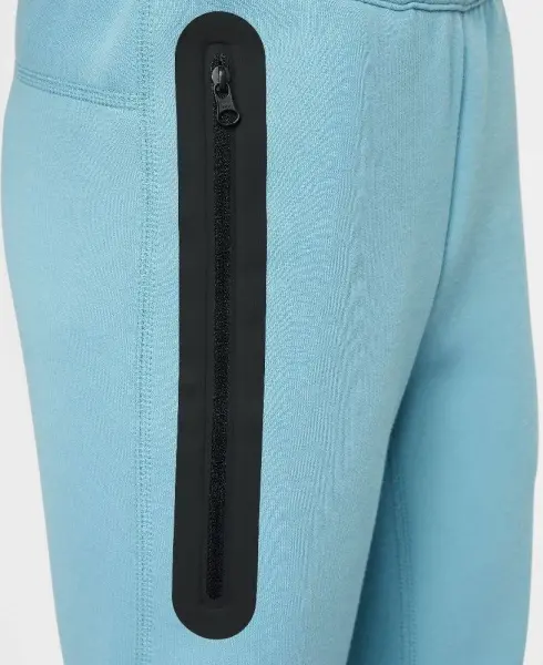 Спортивні штани підліткові Nike TECH FLEECE світло-блакитні FD3287-464
