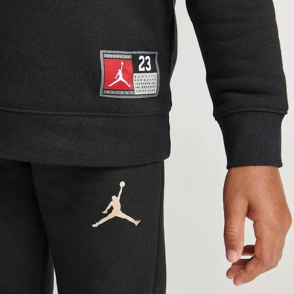Спортивный костюм детский Nike JORDAN JERSEY TRACKSUIT черно-золотой 85C651-K5X