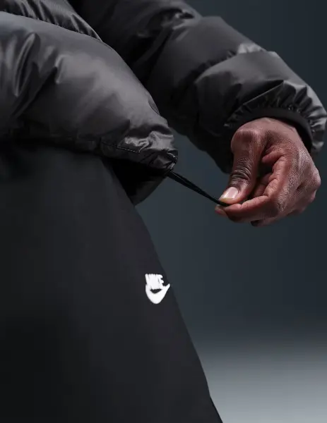 Пуховик Nike WINDRUNNER STATEMENT DOWN JACKET черный HQ7790-011