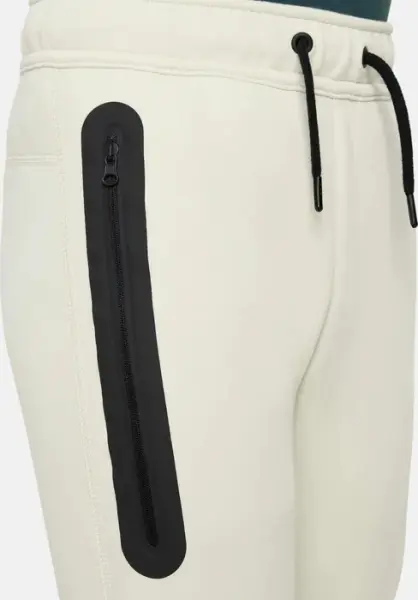Спортивні штани підліткові Nike TECH FLEECE бежеві FD3287-020