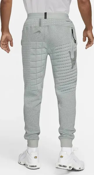 Спортивні штани Nike SPORTSWEAR THERMA-FIT ADV TECH PACK ENGINEERED FLEECE сірі DM5550-034