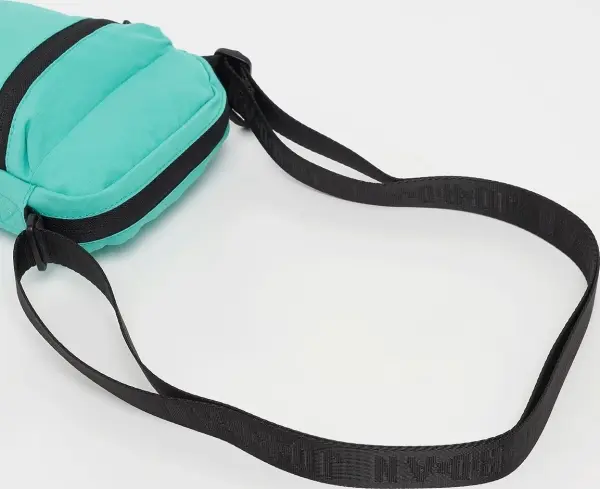 Сумка через плече Nike AIRBORNE FESTIVAL BAG бірюзова 9A0631-B5P
