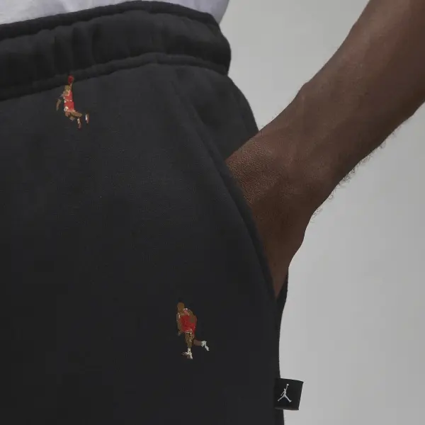 Спортивний костюм Nike ESSENTIALS HOLIDAY JUMPMAN FLEECE чорний DV9392-010__DV9390-010