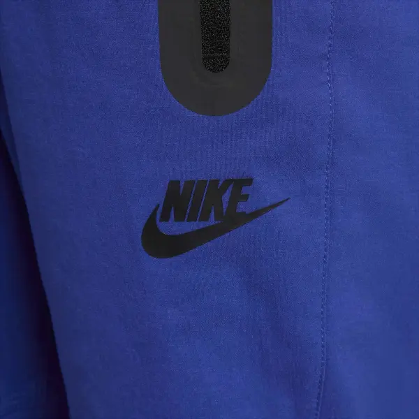 Спортивні штани підліткові Nike TECH WOVEN сині HQ8921-539