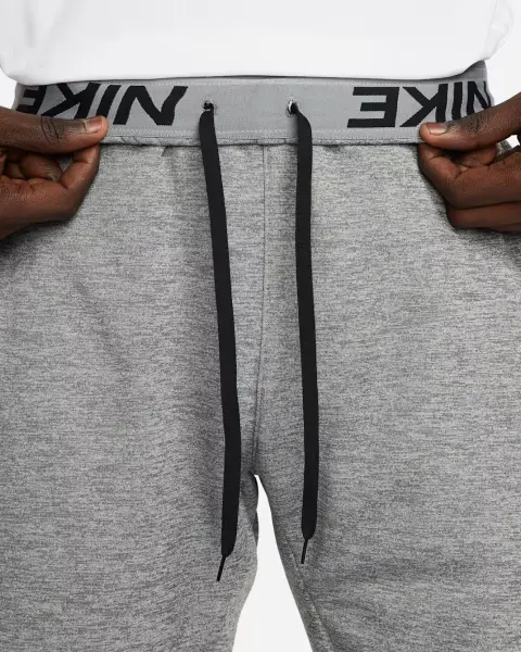 Спортивные штаны Nike THERMA-FIT OPEN HEM FITNESS серые DQ4856-063