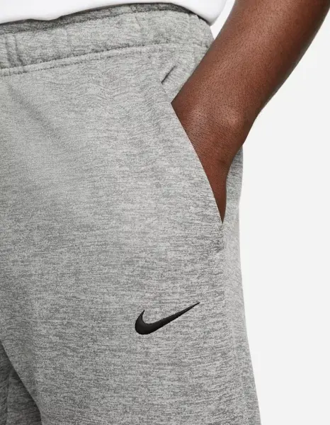 Спортивные штаны Nike THERMA-FIT OPEN HEM FITNESS серые DQ4856-063