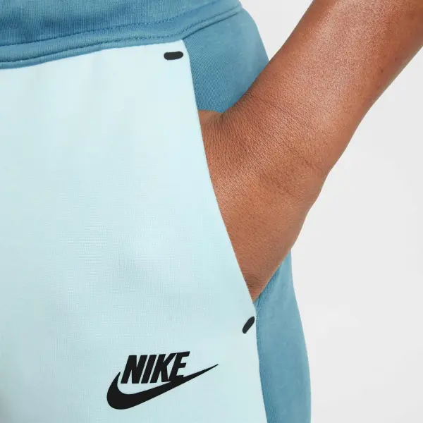 Спортивные штаны подростковые Nike SPORTSWEAR TECH FLEECE темно-бирюзово-голубые HV5869-006