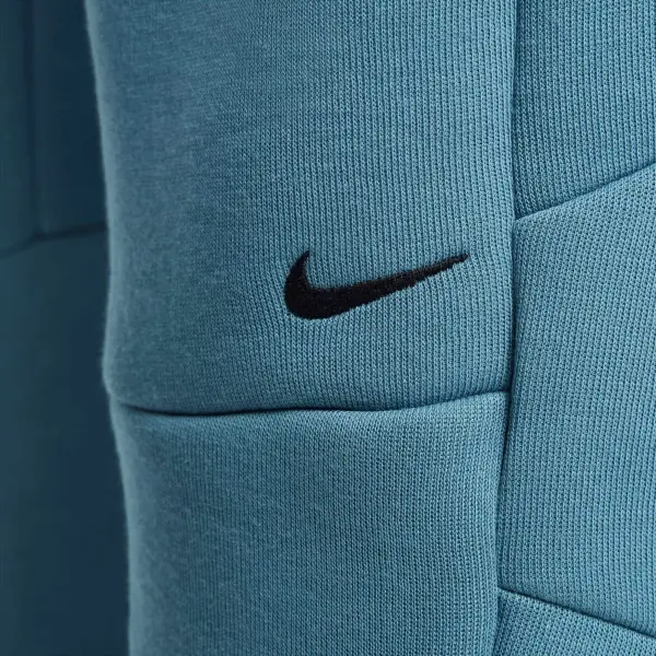 Спортивные штаны подростковые Nike SPORTSWEAR TECH FLEECE темно-бирюзово-голубые HV5869-006