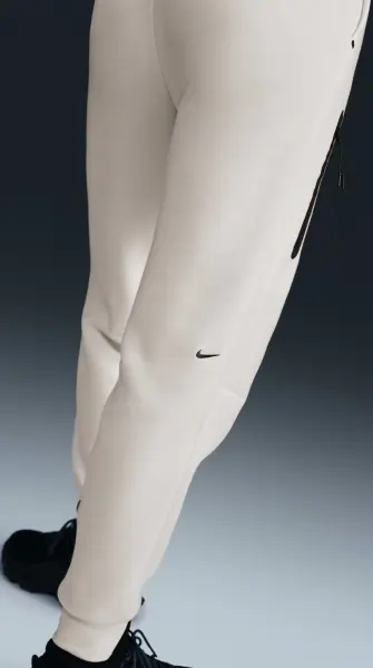 Спортивні штани жіночі Nike SPORTSWEAR TECH FLEECE MID-RISE молочні HV6779-110