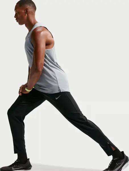 Спортивные штаны для бега Nike STRIDE DRI-FIT черные HV4544-010