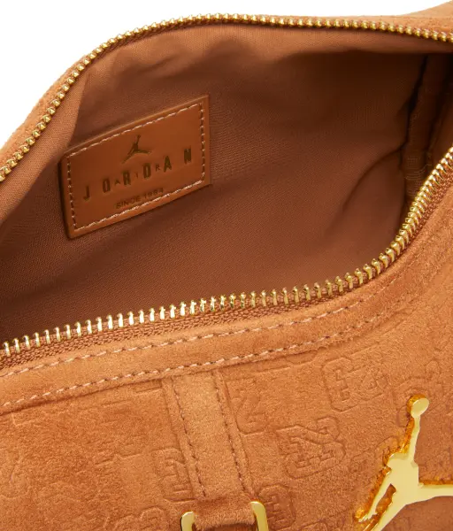 Сумка через плече Nike JORDAN SUEDE MONOGRAM MINI DUFFEL 3L помаранчева MA9209-X6X