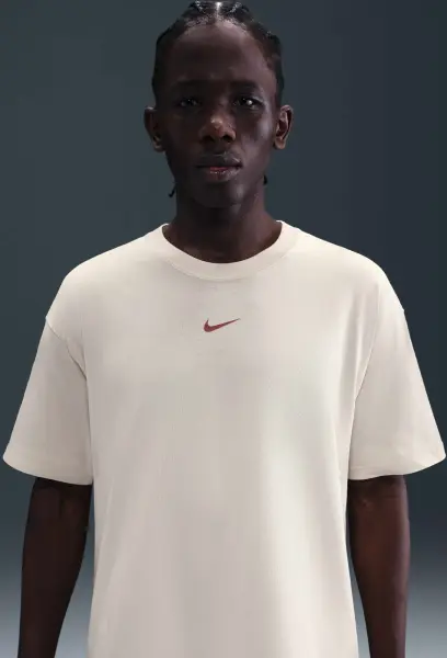 Футболка Nike NOCTA бежева IB5673-104