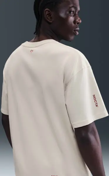 Футболка Nike NOCTA бежева IB5673-104