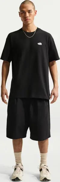 Футболка Nike SPORTSWEAR VOMERO PATCH чорна IH1149-010