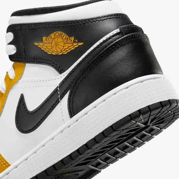 Кросівки підліткові Nike AIR JORDAN 1 MID (GS) жовто-біло-чорні DQ8423-701