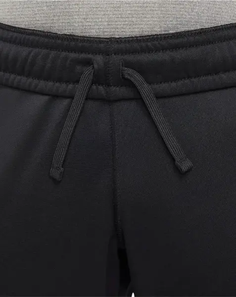Спортивные штаны подростковые Nike THERMA-FIT GRAPHIC TAPERED черные DR8464-010