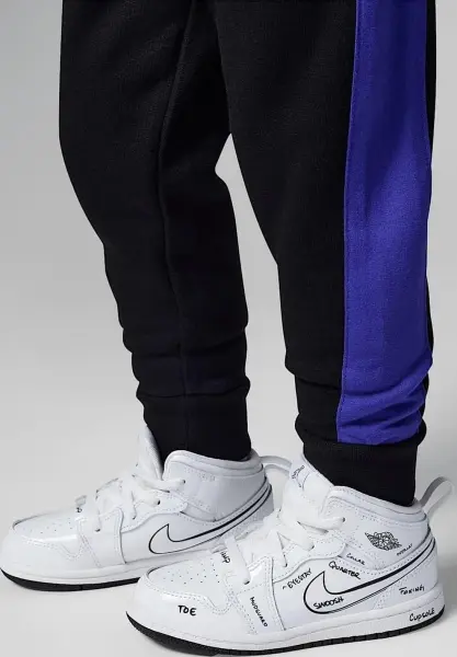 Спортивний костюм дитячий Nike JORDAN BASELINDE фіолетово-чорно-жовтий 75C053-023