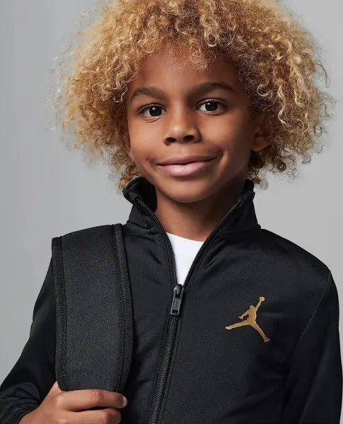Спортивний костюм дитячий Nike TAKE FLIGHT TRICOT чорно-золотий 85C811-023