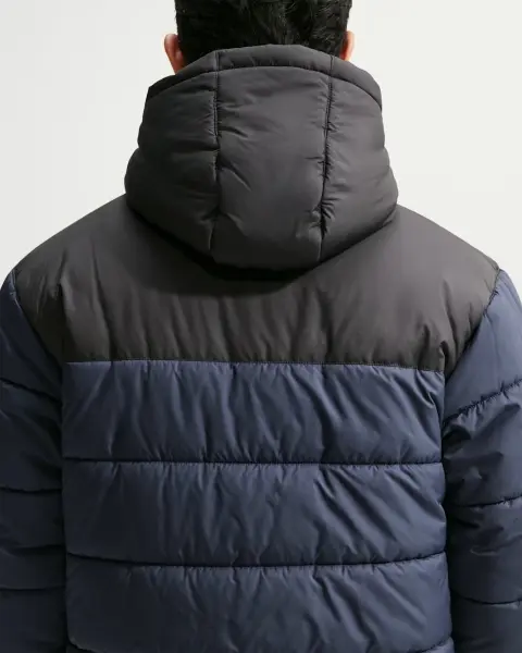 Куртка Nike SPORTSWEAR PRIMALOFT THERMA-FIT LOOSE PUFFER темно-синьо-чорна IO4895-451