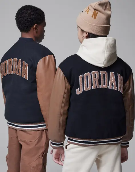 Куртка підліткова Nike JORDAN VARSITY чорно-коричнева 95D197-X1I