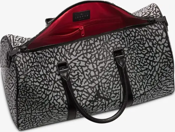 Сумка Nike JORDAN MONOGRAM DUFFLE BAG 25L біло-чорна MM0978-I00