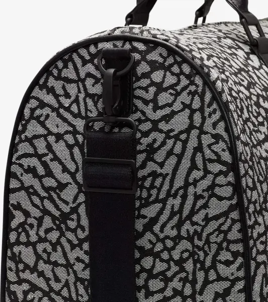 Сумка Nike JORDAN MONOGRAM DUFFLE BAG 25L біло-чорна MM0978-I00