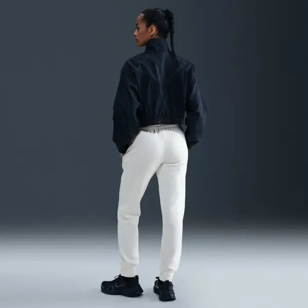 Спортивні штани жіночі Nike PHOENIX FLEECE MID-RISE PANTS кремові FZ7626-133