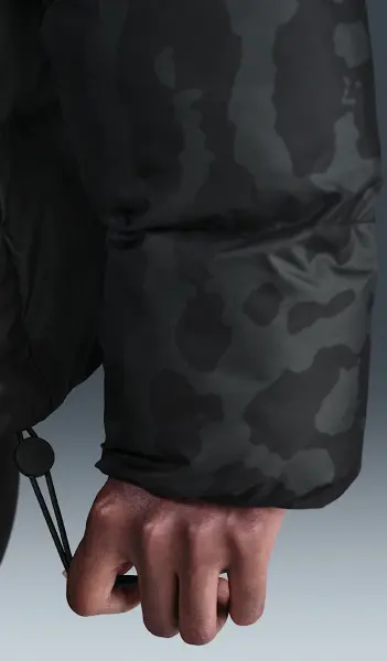 Куртка женская Nike SPORTSWEAR THERMA-FIT PUFFER черно-серая HV5101-010