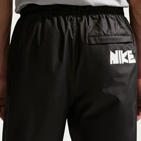 Штаны спортивные Nike WINDRUNNER WOVEN GRAPHIC черно-белые IF0842-010