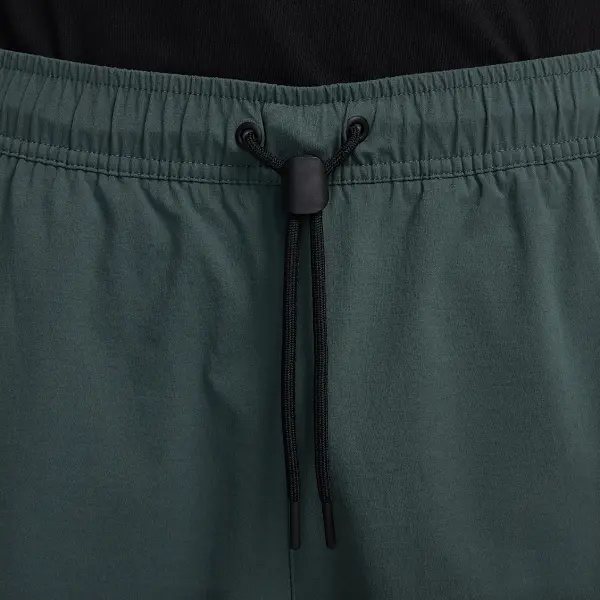 Штани спортивні Nike TECH WOVEN темно-зелено-чорні HM8241-338