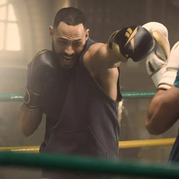 Рукавички боксерські Reebok BOXING GLOVES чорно-золоті (10 унцій) RSCB-11117GB-10